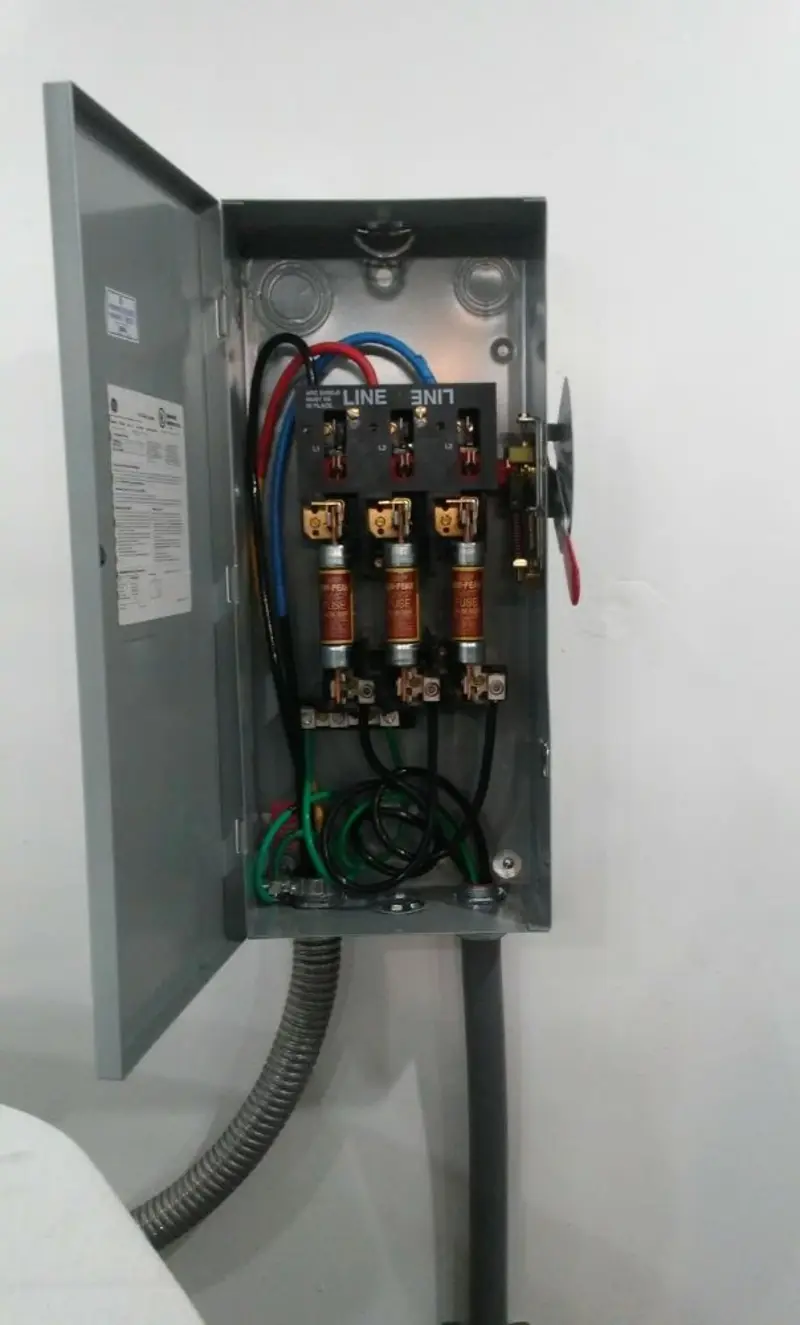 Three-phase disconnect switch installed for Smoke Detector Installation in Atchison